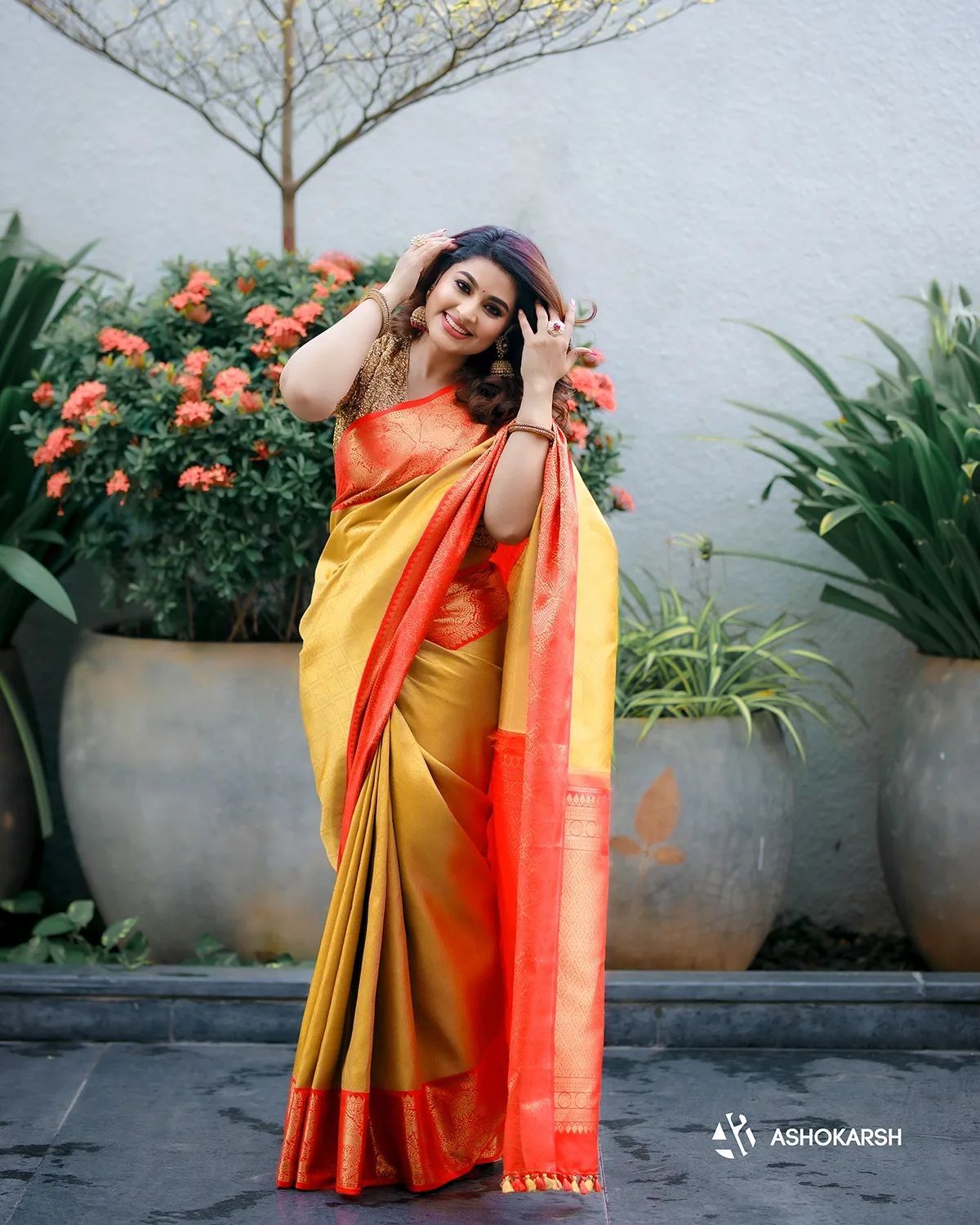 Yellow and Red Golden Design Vandita Dola Silk Saree