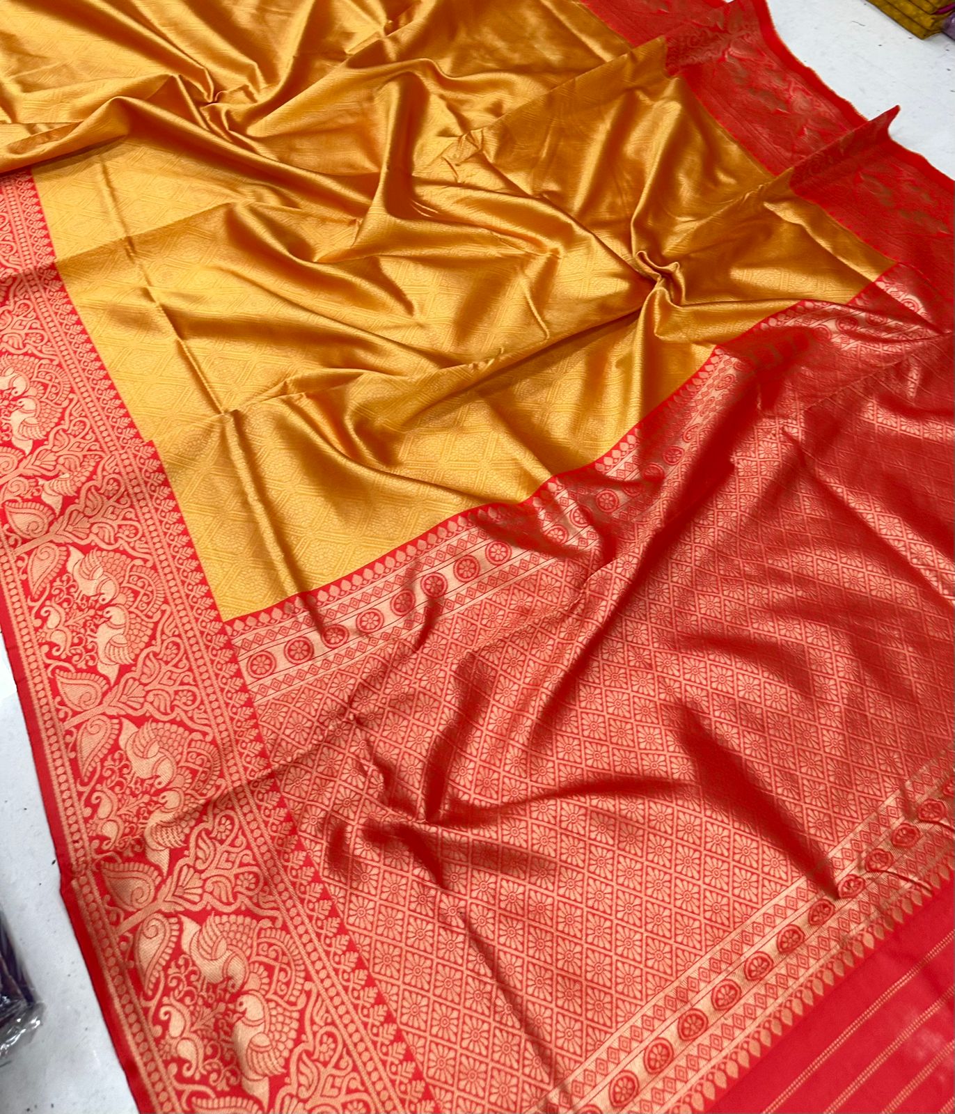 Yellow and Red Golden Design Vandita Dola Silk Saree